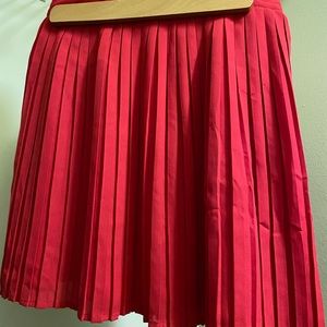 Red pleated skirt size S